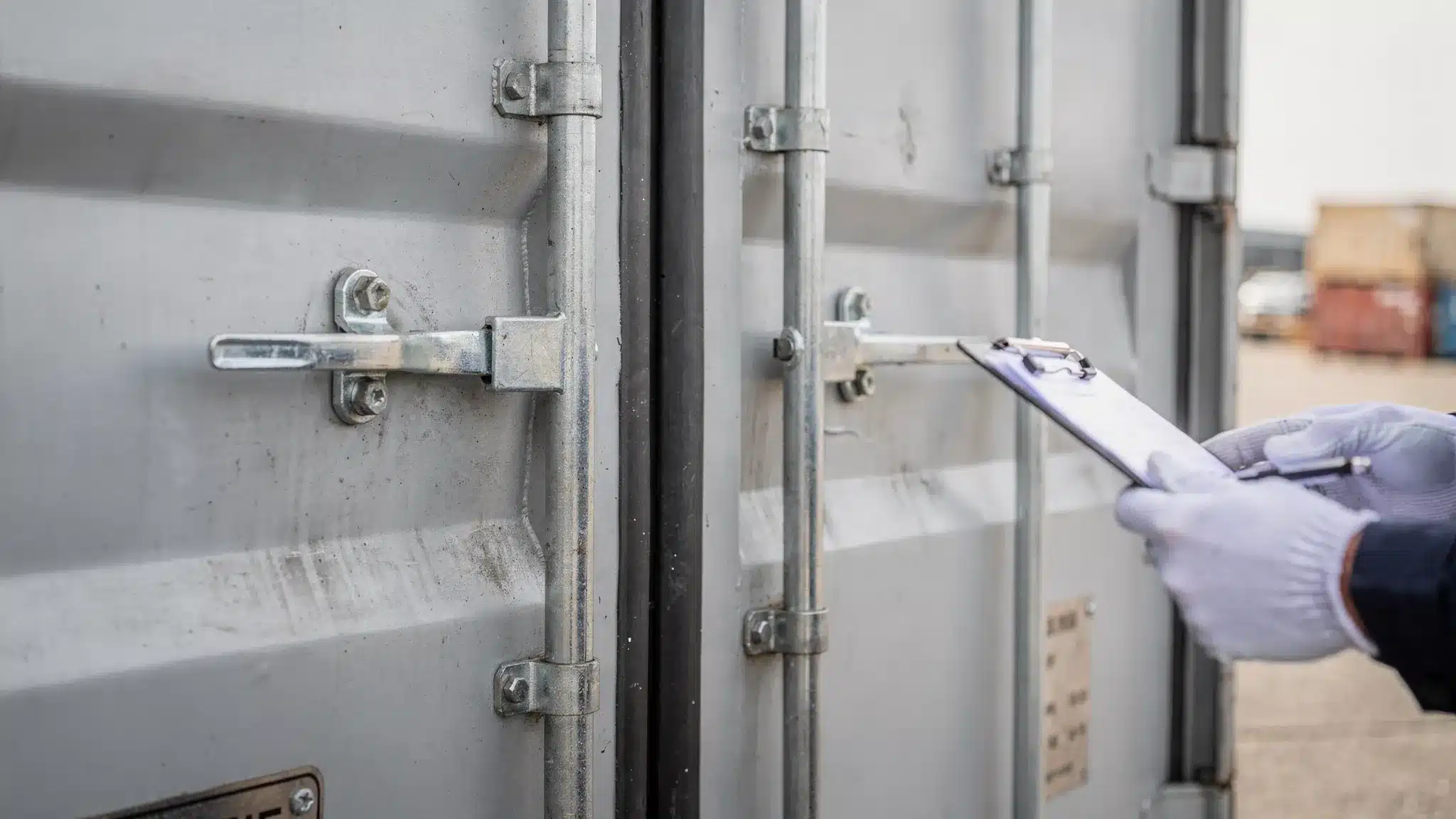 Shipping Containers Near Me: How to Vet Sellers Fast 2 A close-up inspection view of shipping container doors showing intact rubber gaskets, locking rods, hinge areas, and a clean door frame, highlighting common checkpoints buyers should verify.